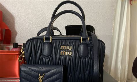 is my miu miu bag fake|authentic miu miou bag.